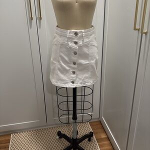 White denim mini skirt.